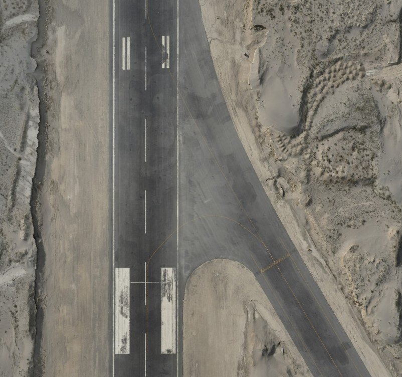 Aerial orthomosaic view of an airport runway captured during the survey